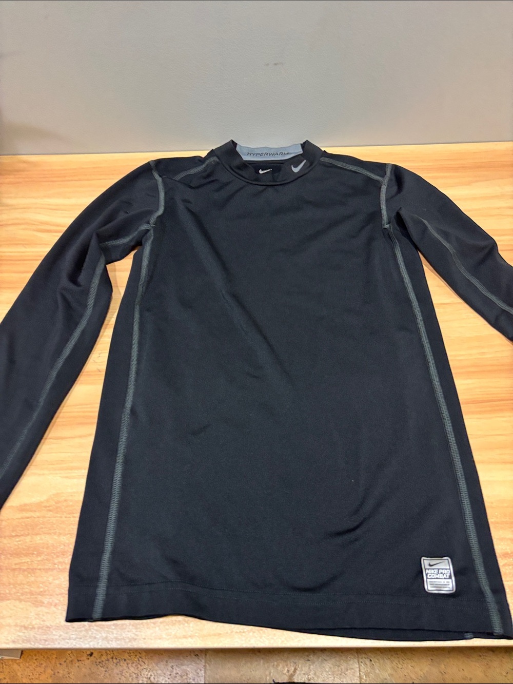 Youth Nike Black Long Sleeve Athletic Compression Top with Gray Stitching